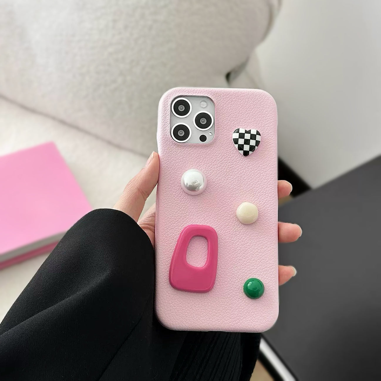Pinke Handyhülle aus Leder mit Candy-Motiv